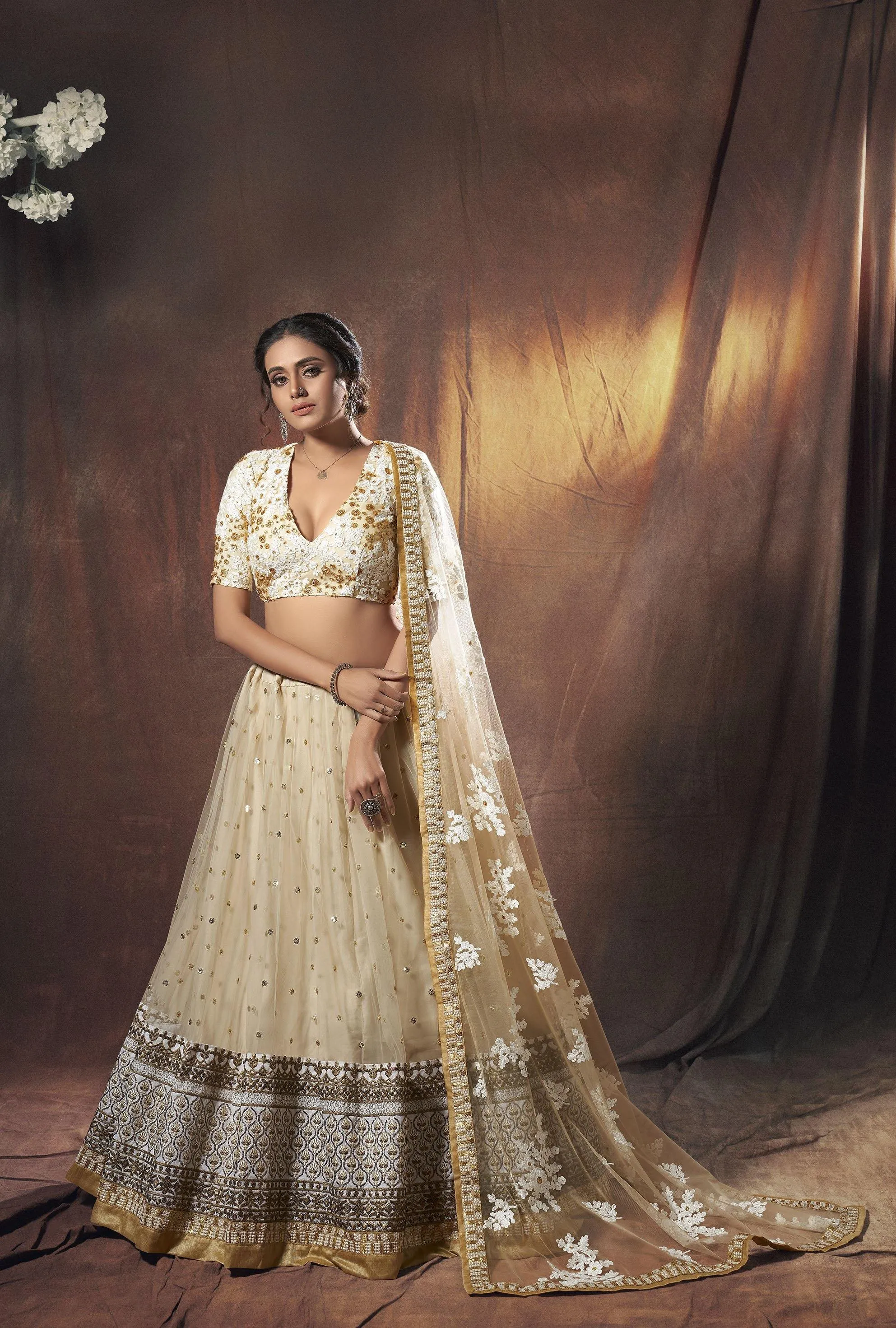 Beige Glittered Heavy Border Designer Wedding Guest Lehenga