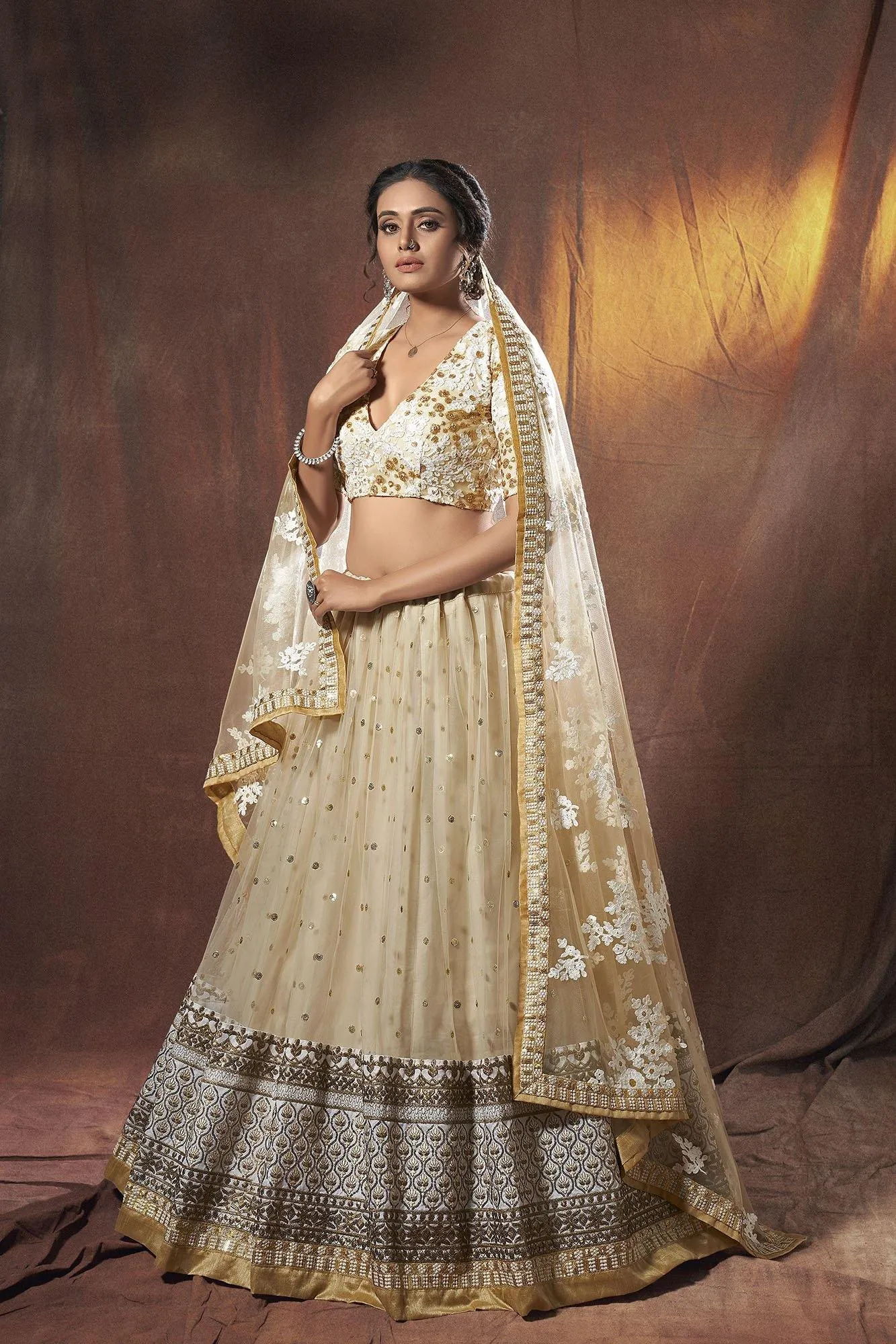 Beige Glittered Heavy Border Designer Wedding Guest Lehenga