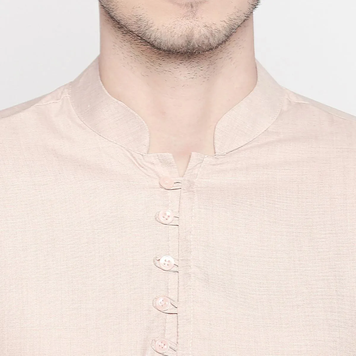 Beige Solid Pure Cotton Kurta With Asymmetric Hem
